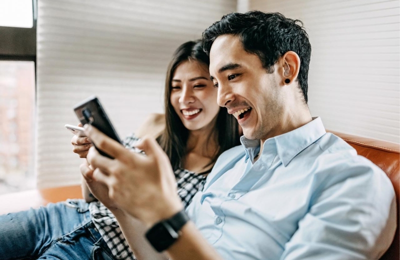 Couple looking at phone