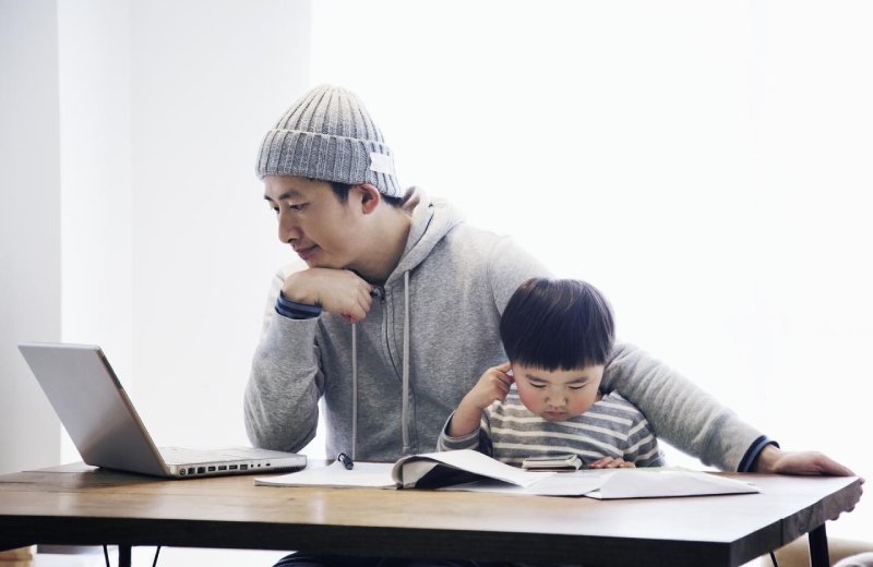 Dad working with kid