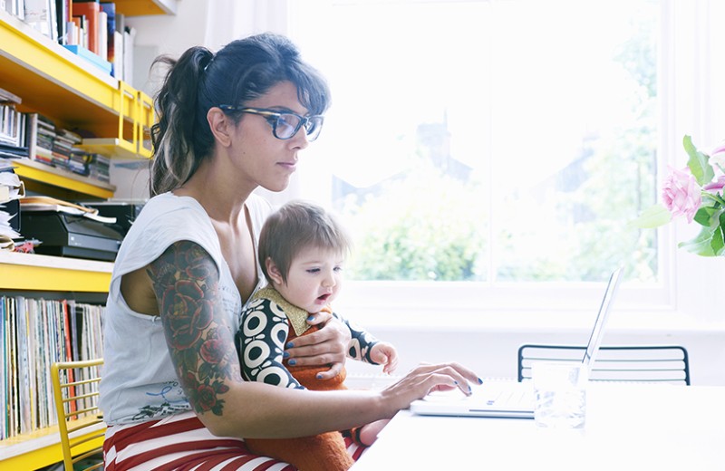 Woman sitting at laptop